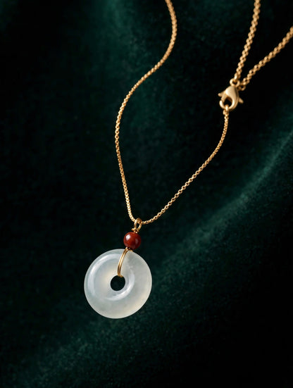 White Jade Donut Necklace with Red Bead Accent